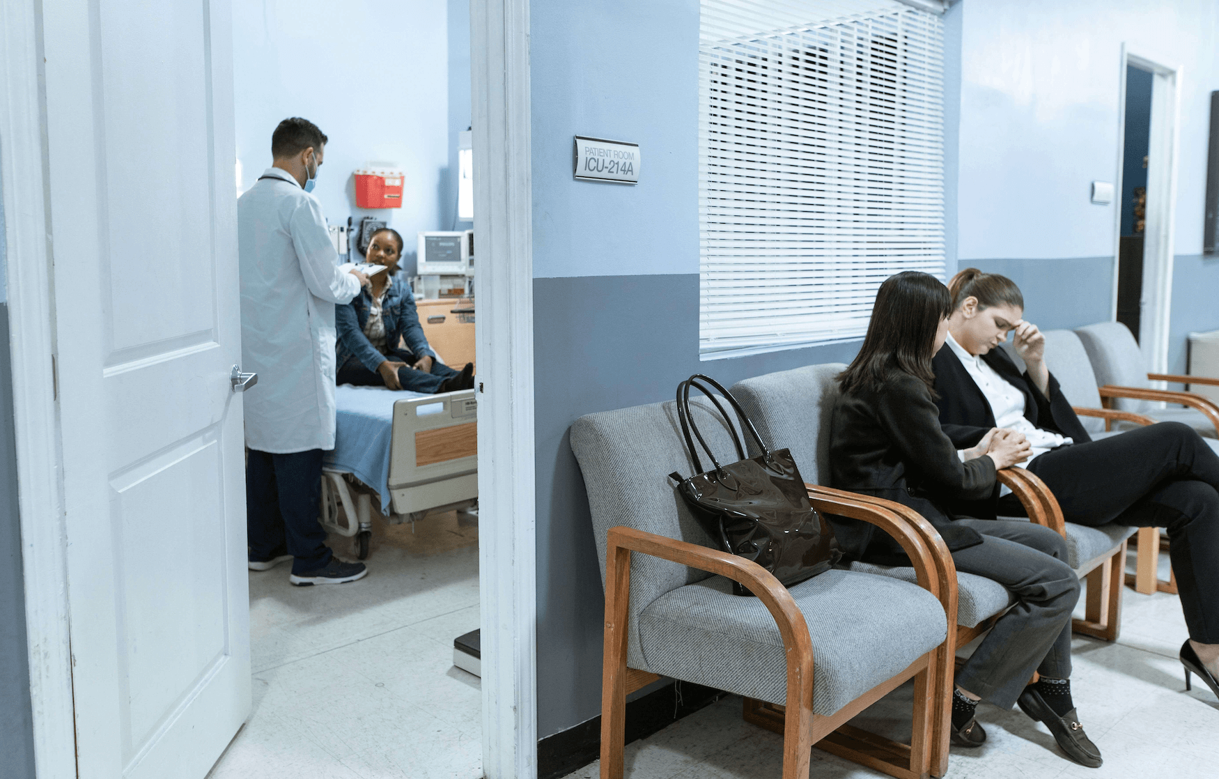 People at the hospital talking to each other.